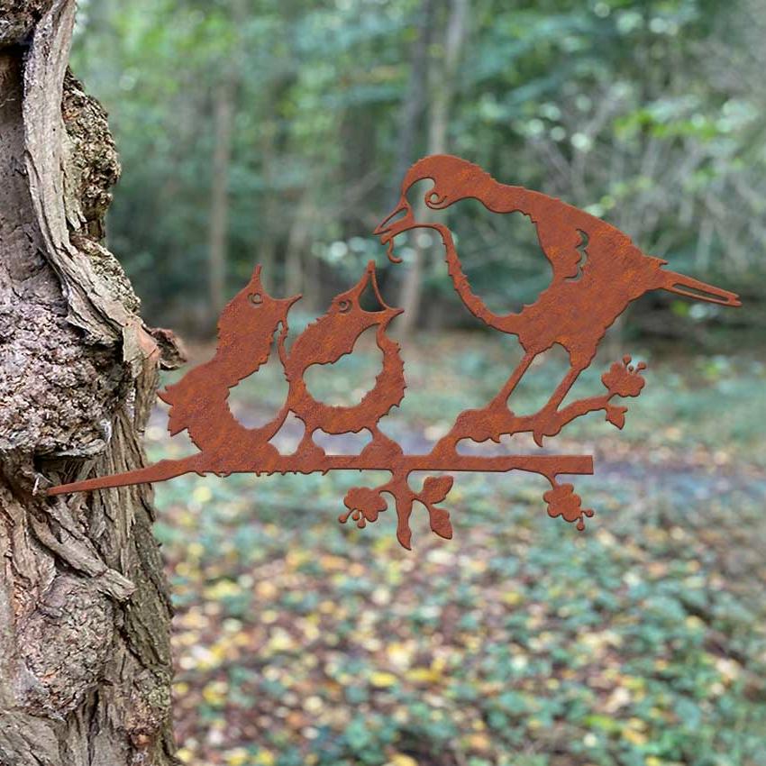Rost Baumstecker Rotkehlchen mit Küken