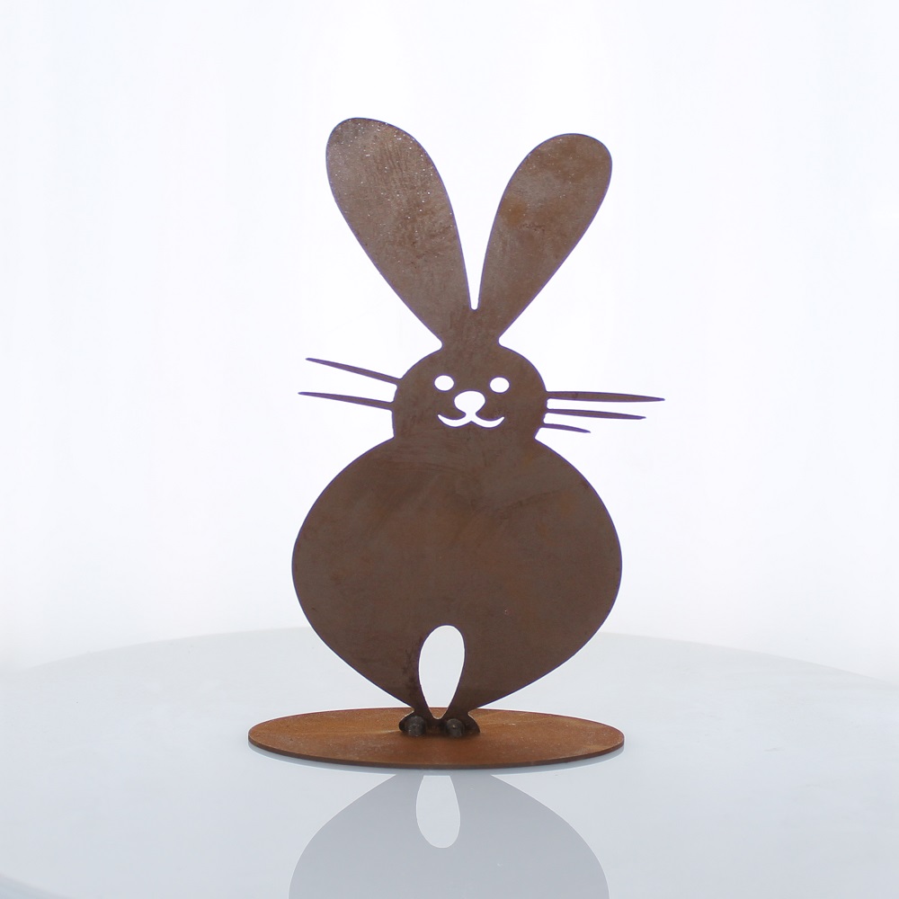 Rost Hase auf Platte sitzend/rund